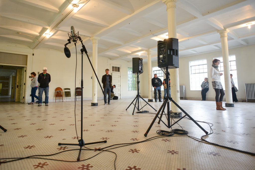 Dayroom with speakers and microphone foregrounded